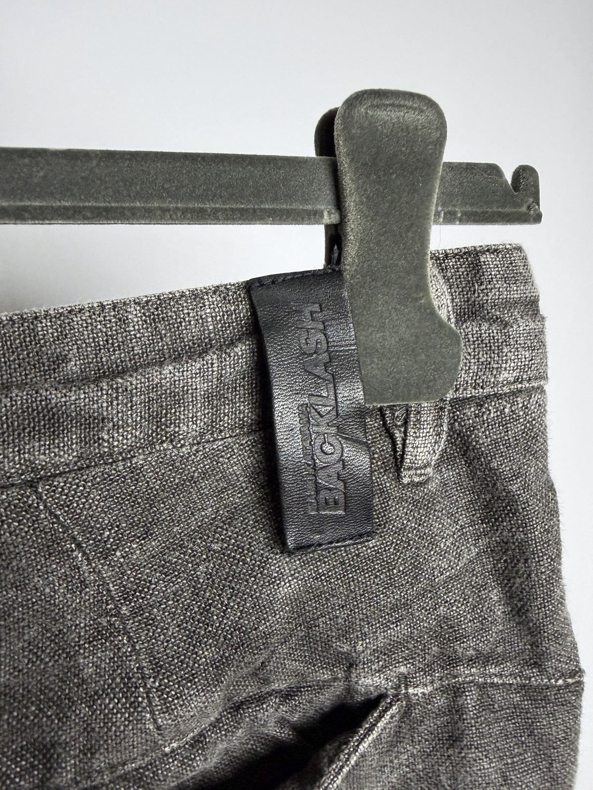 Embossed leather BACKLASH tab