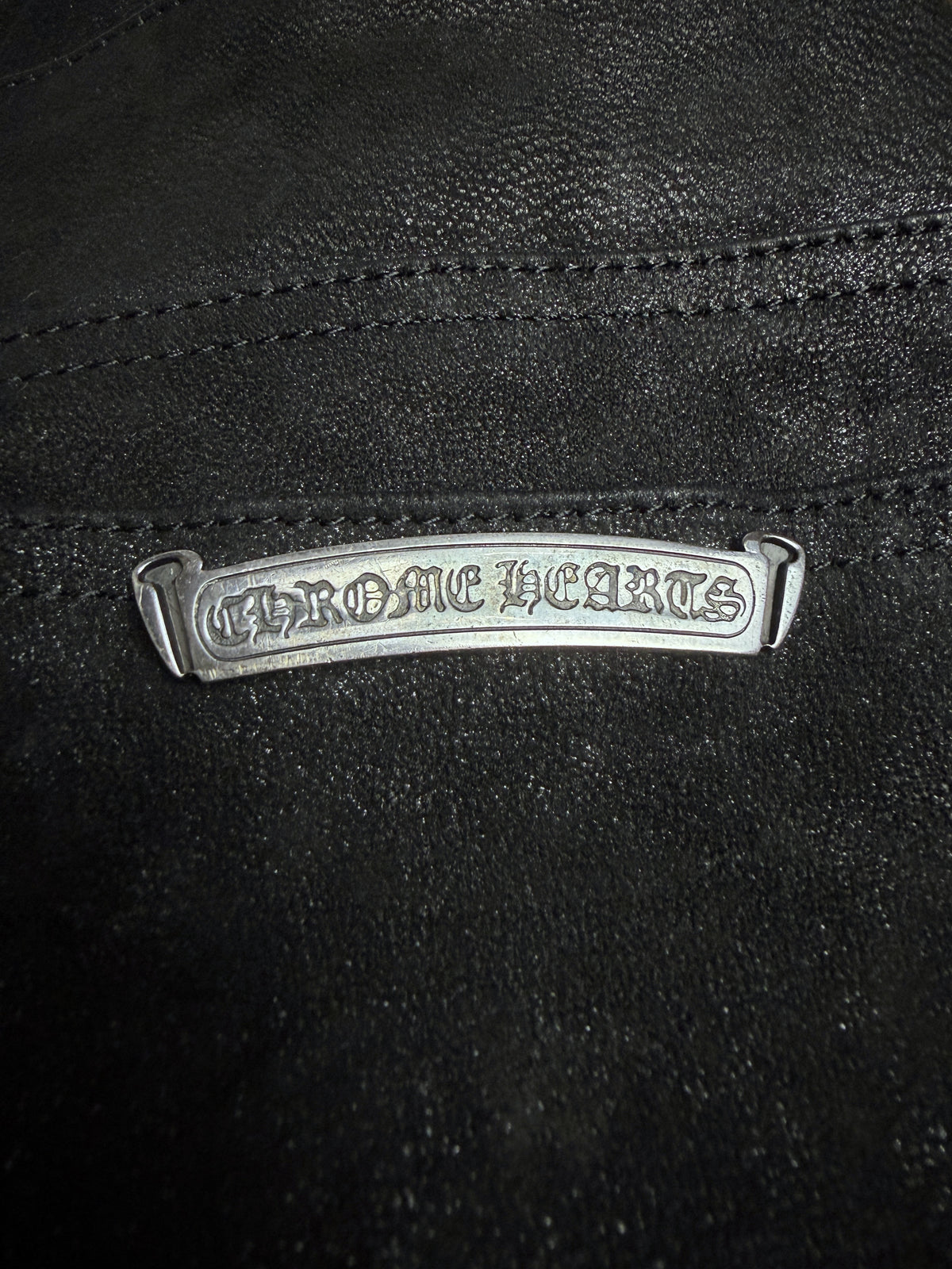 CHROME HEARTS banner nameplate above the back pocket