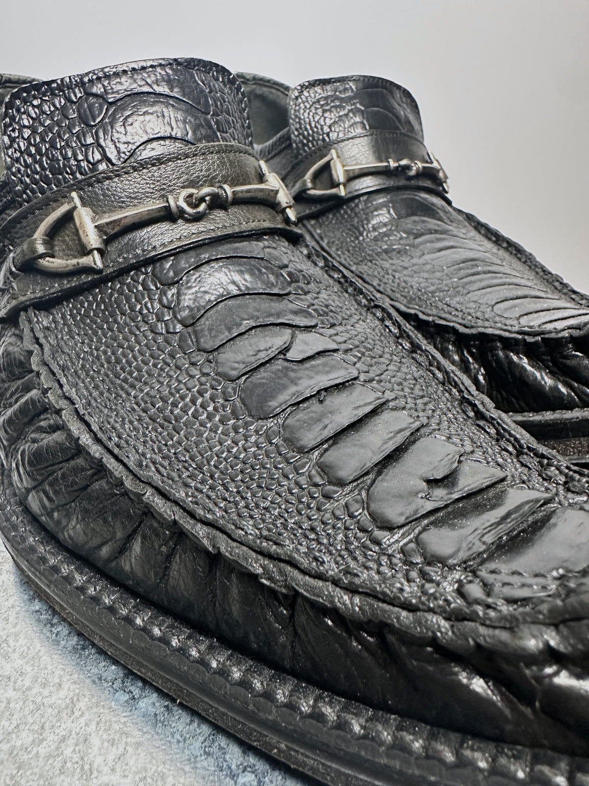 Embossed grain and whipstitch