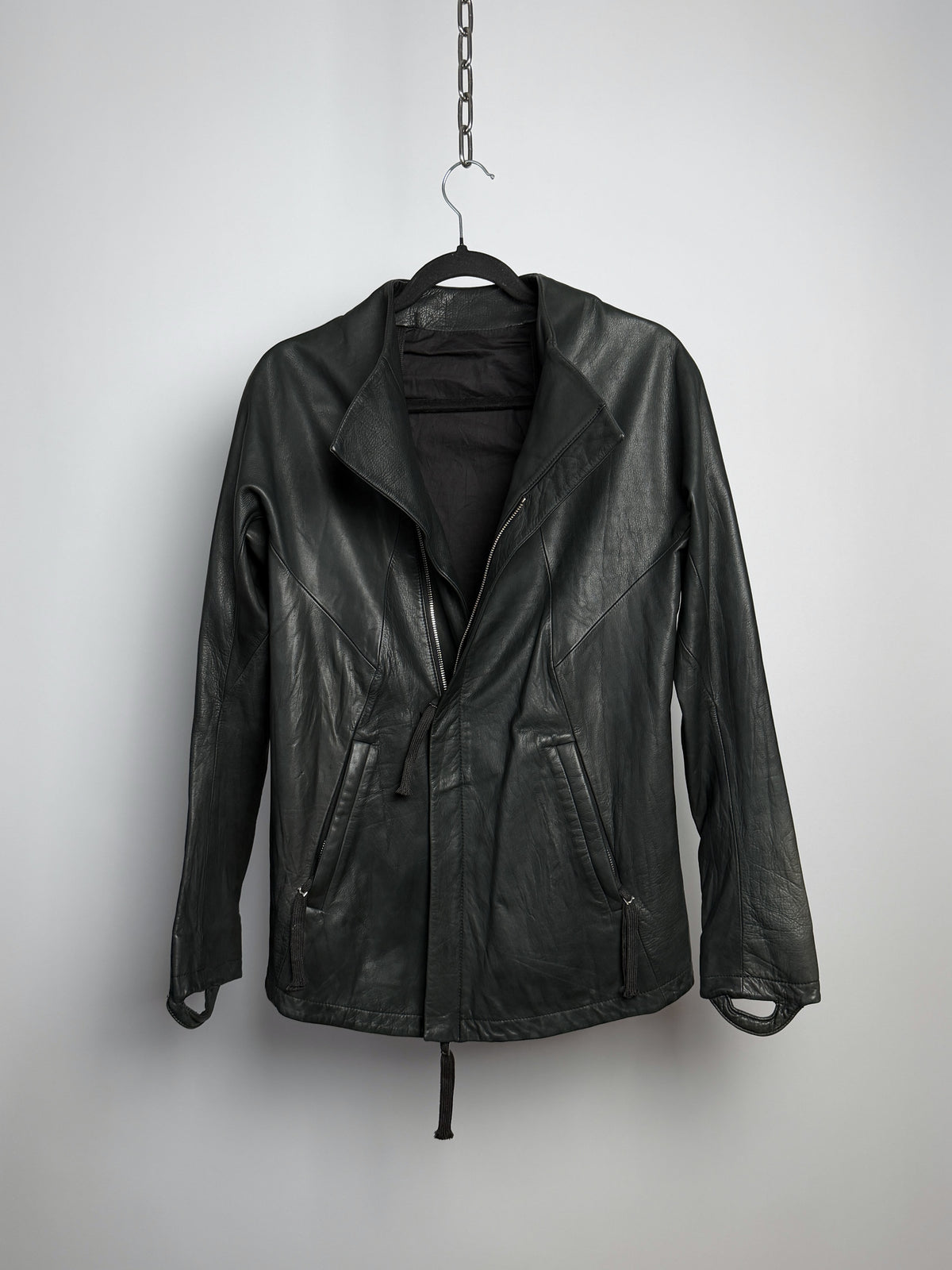 Front, zipped to the collar