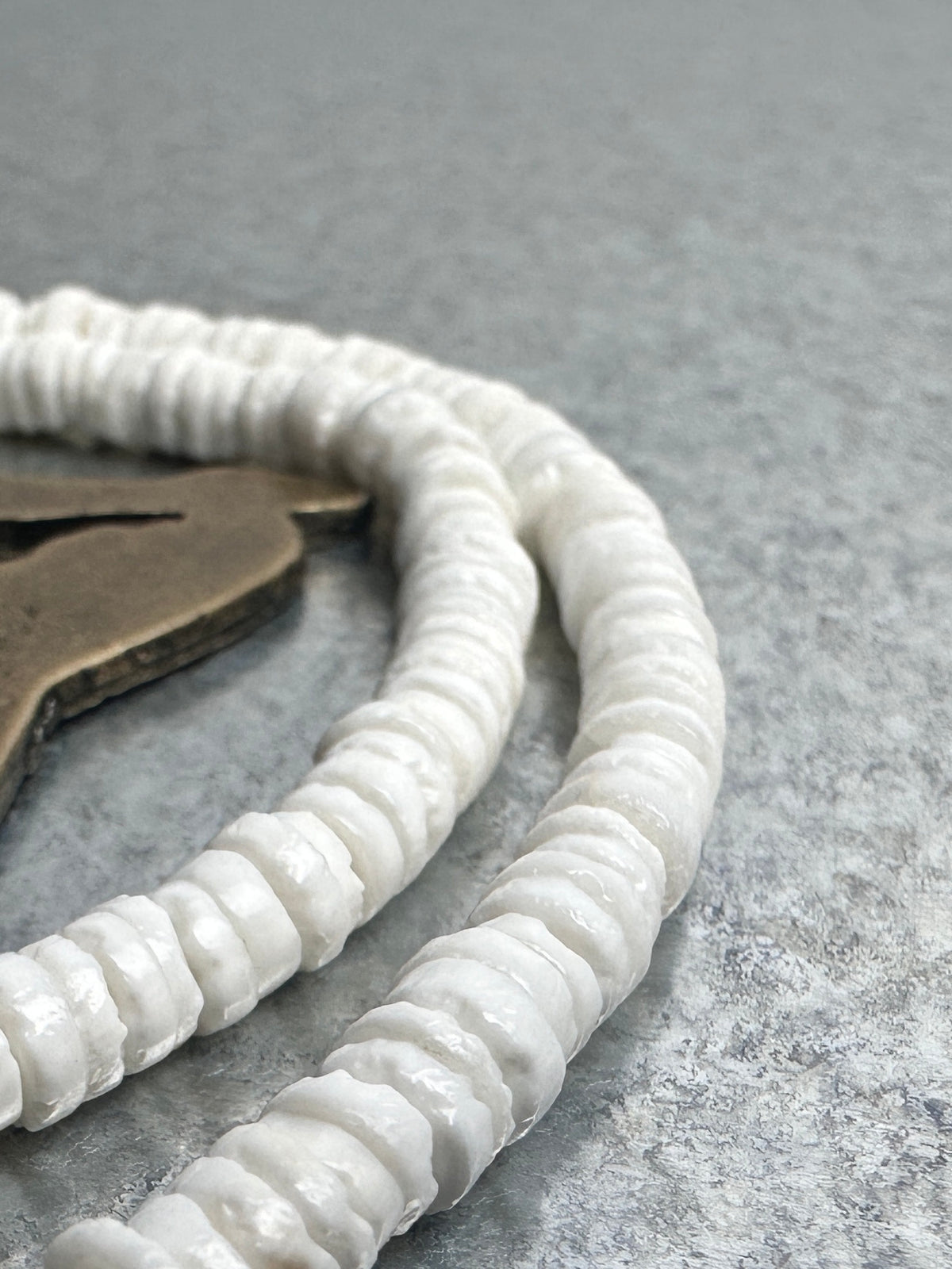 Shell heishi beads, macro