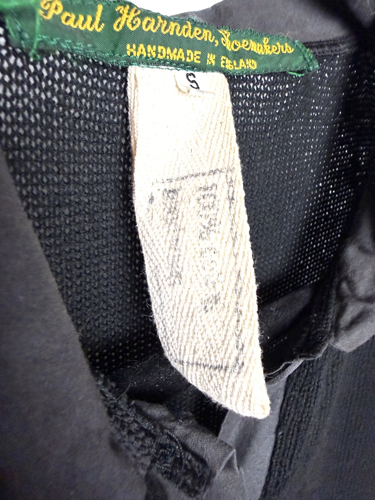 Label and cotton tab marked S