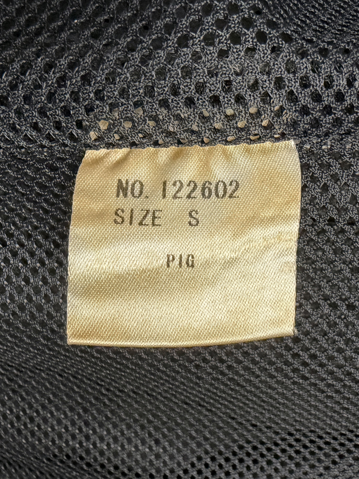 Interior tag, NO. 122602, size S, PIG