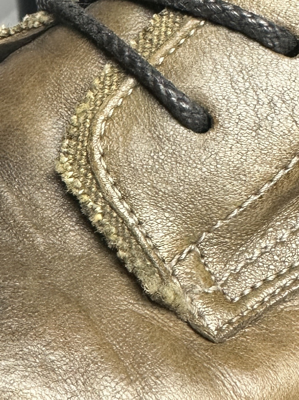 Raw canvas trim at the facing, close