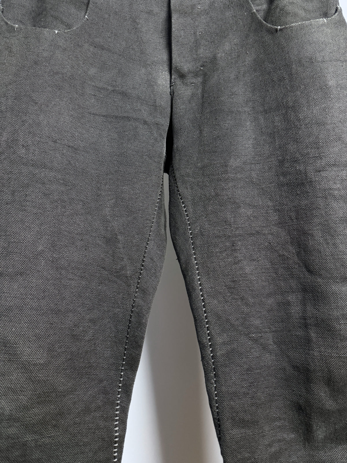 Angled raw hem over overlock