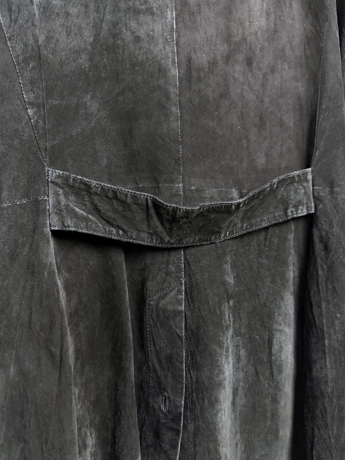 Half-belt across the small of the back