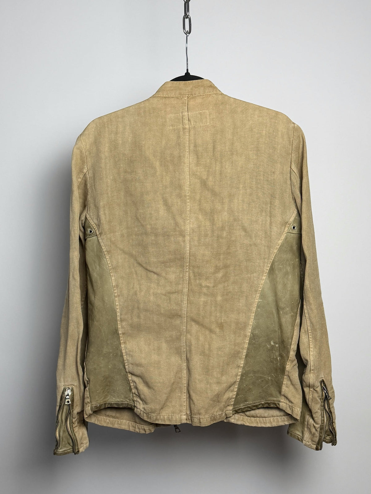 Back, leather panels through the sides