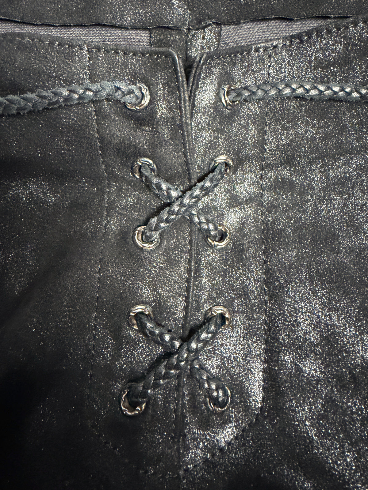 Lace-up fly on braided leather cords