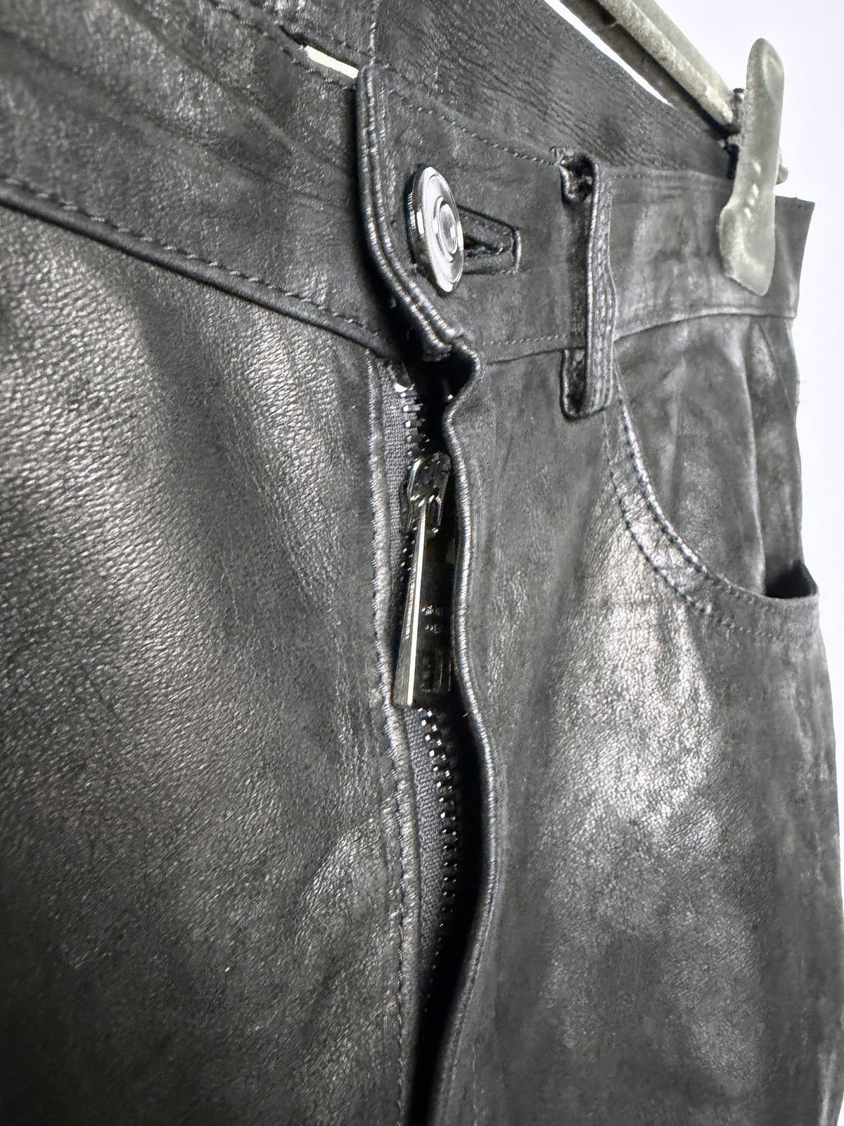 Fly open, zip and waist