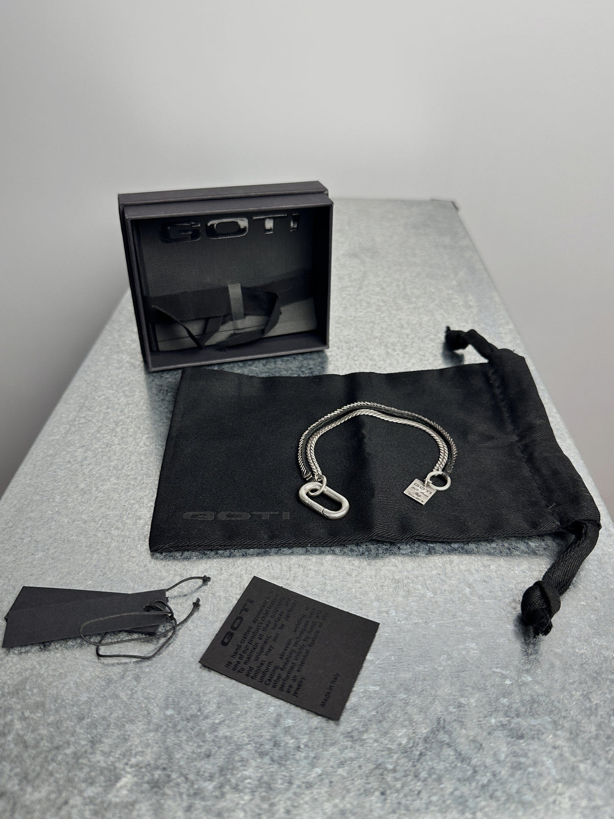 GOTI Cuban link and leather bracelet, with box and pouch