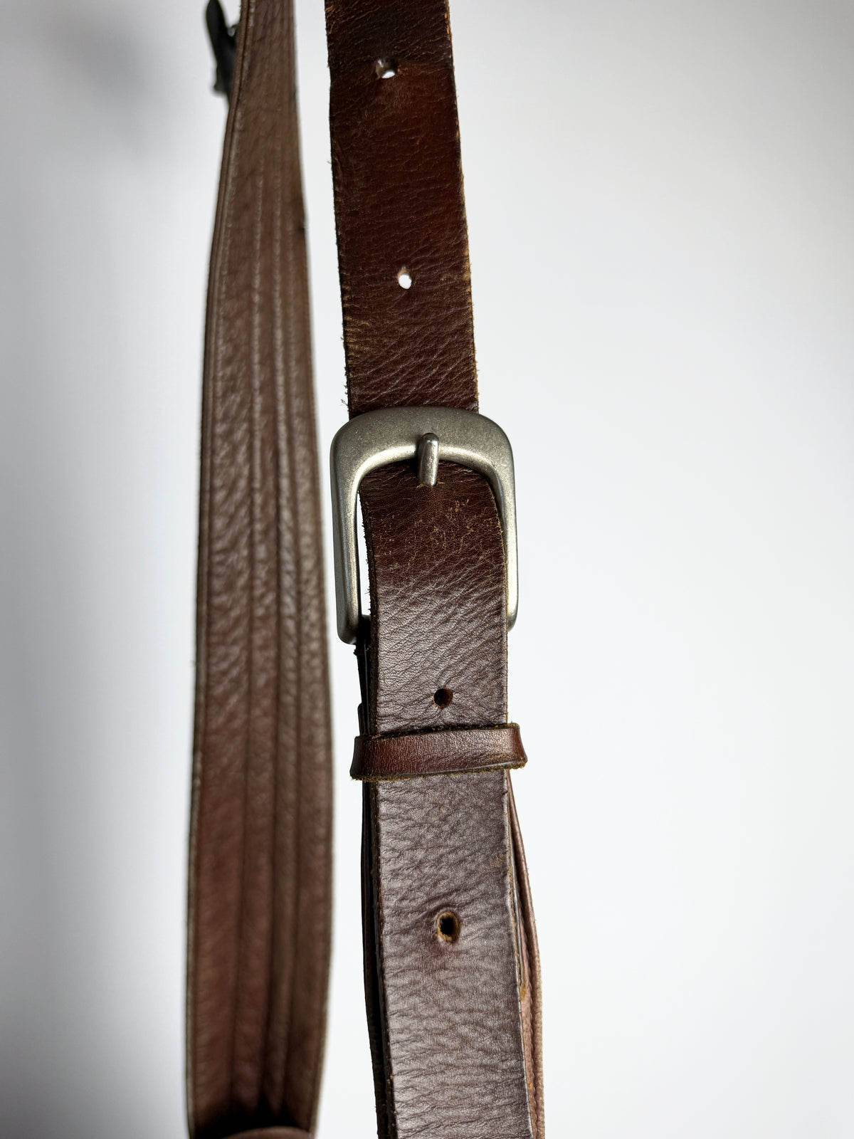 Strap adjuster buckle