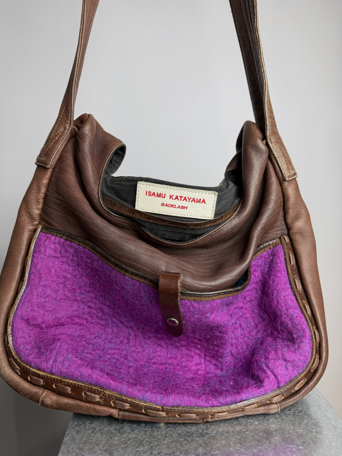Felted wool pocket and the label inside