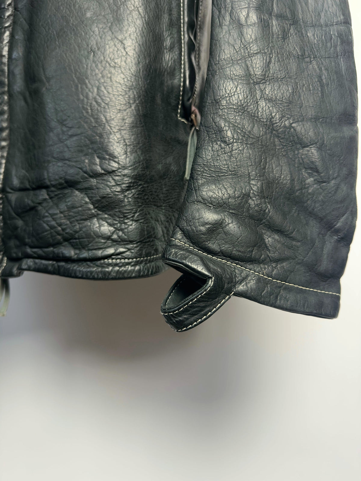 Cuff with thumb strap