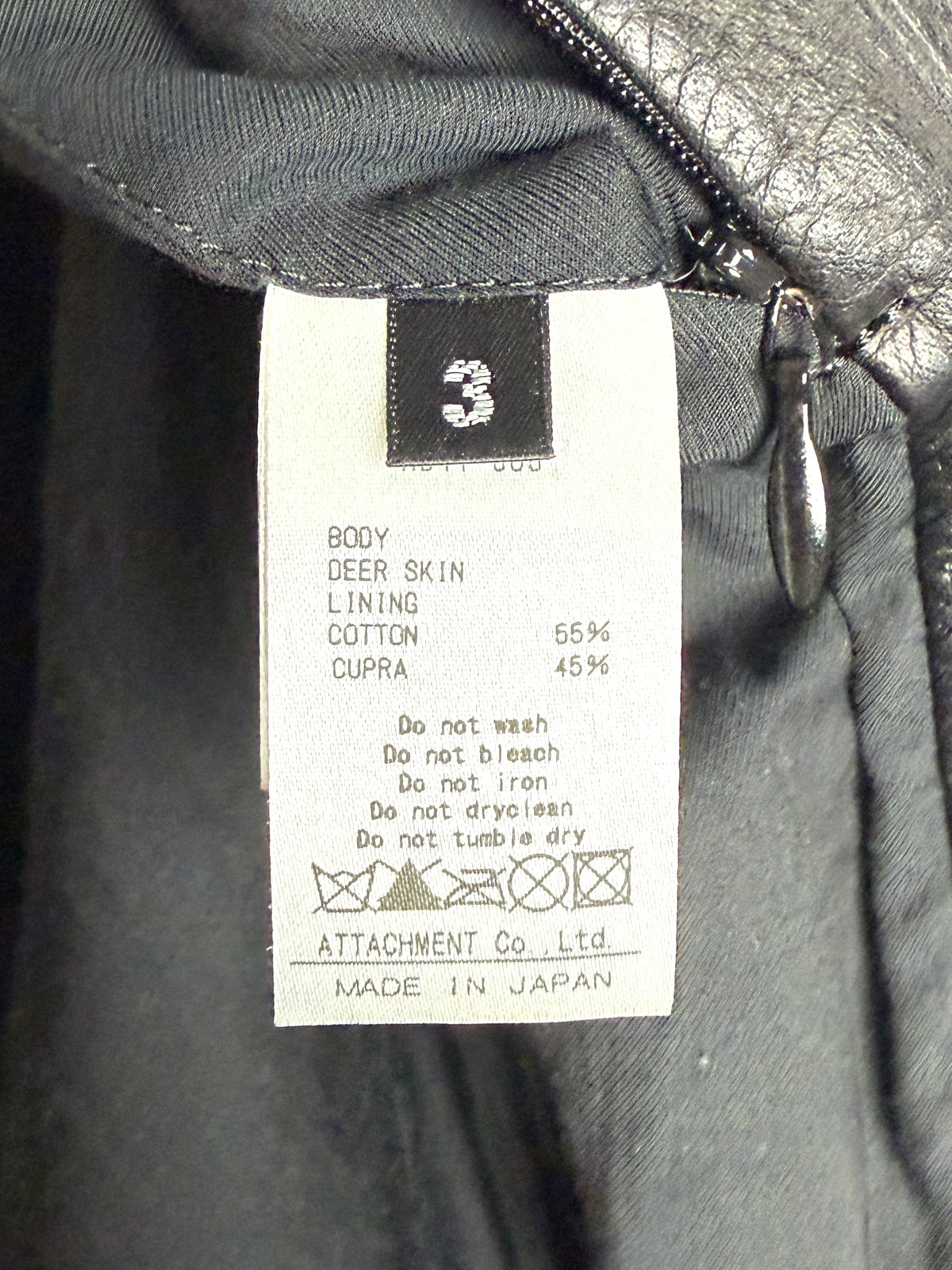 Care tag reading BODY DEER SKIN, size 3, made in Japan
