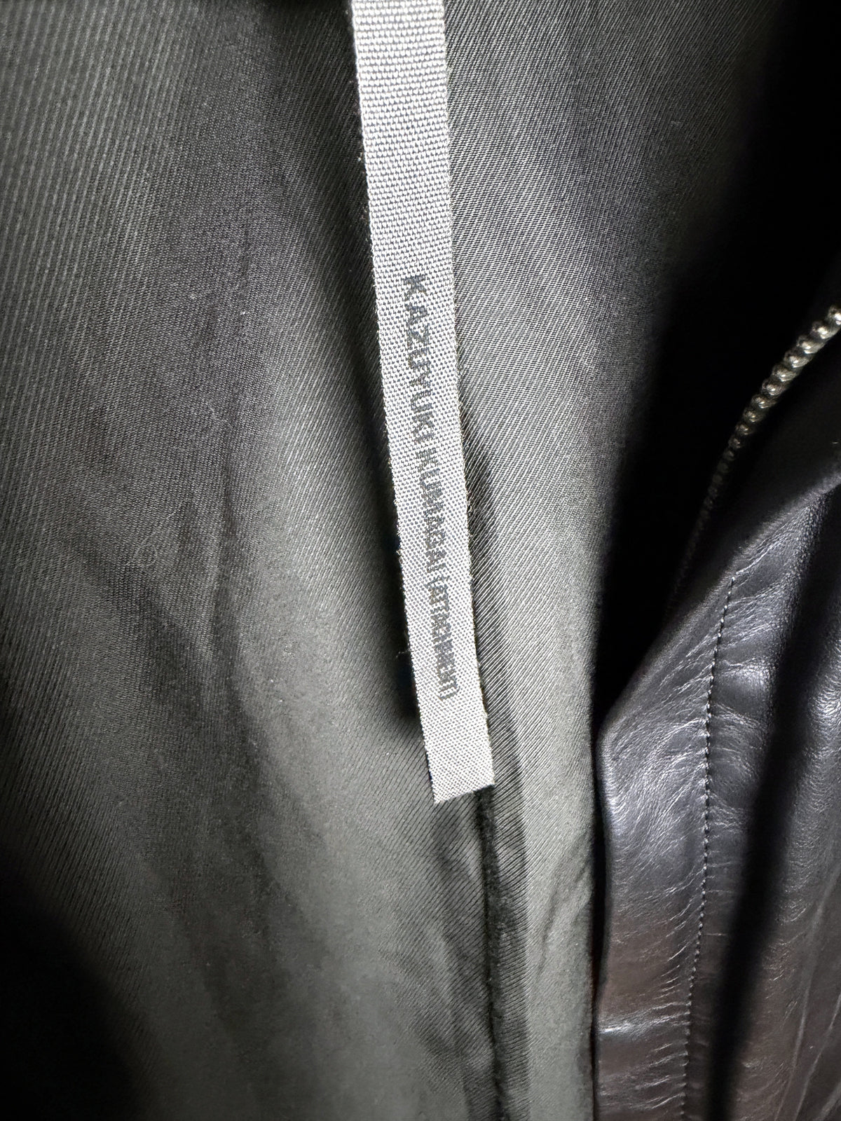 Kazuyuki Kumagai ATTACHMENT lamb leather single riders, brand tab