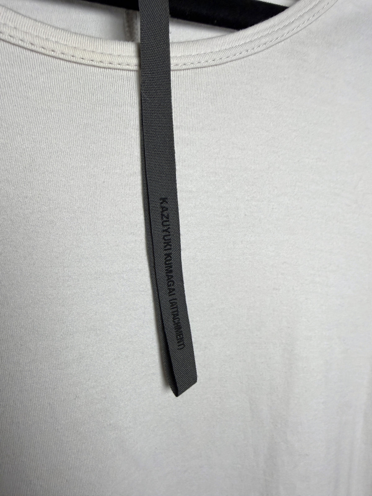 Kazuyuki Kumagai ATTACHMENT three-quarter sleeve tee, brand tab