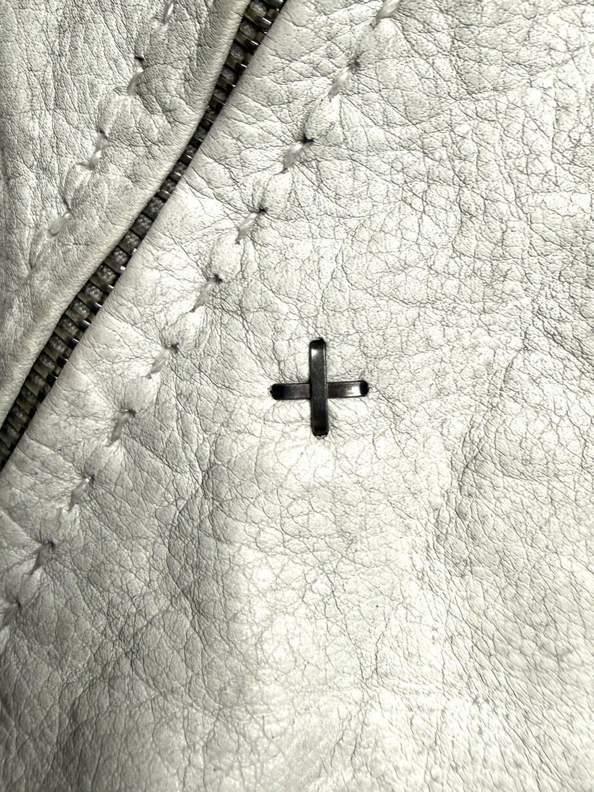 The m.a+ cross set into the cuff