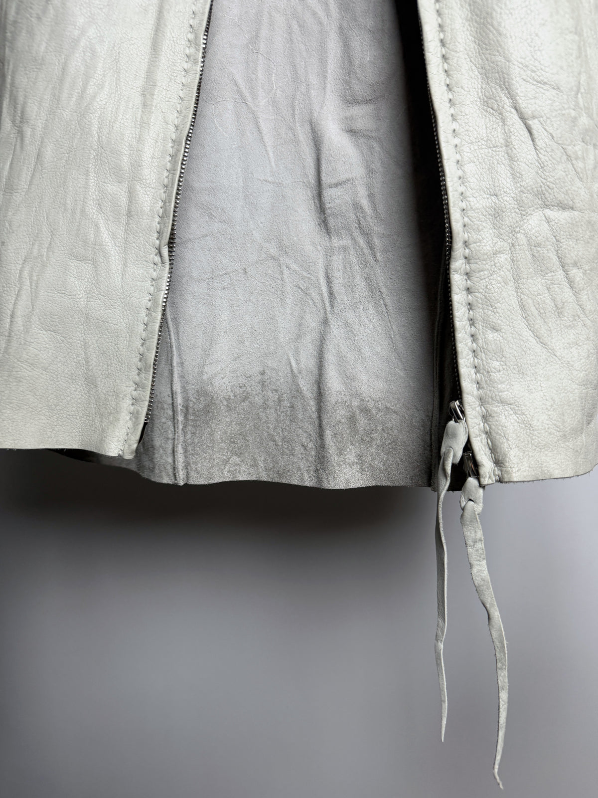 Open at the hem, suede reverse