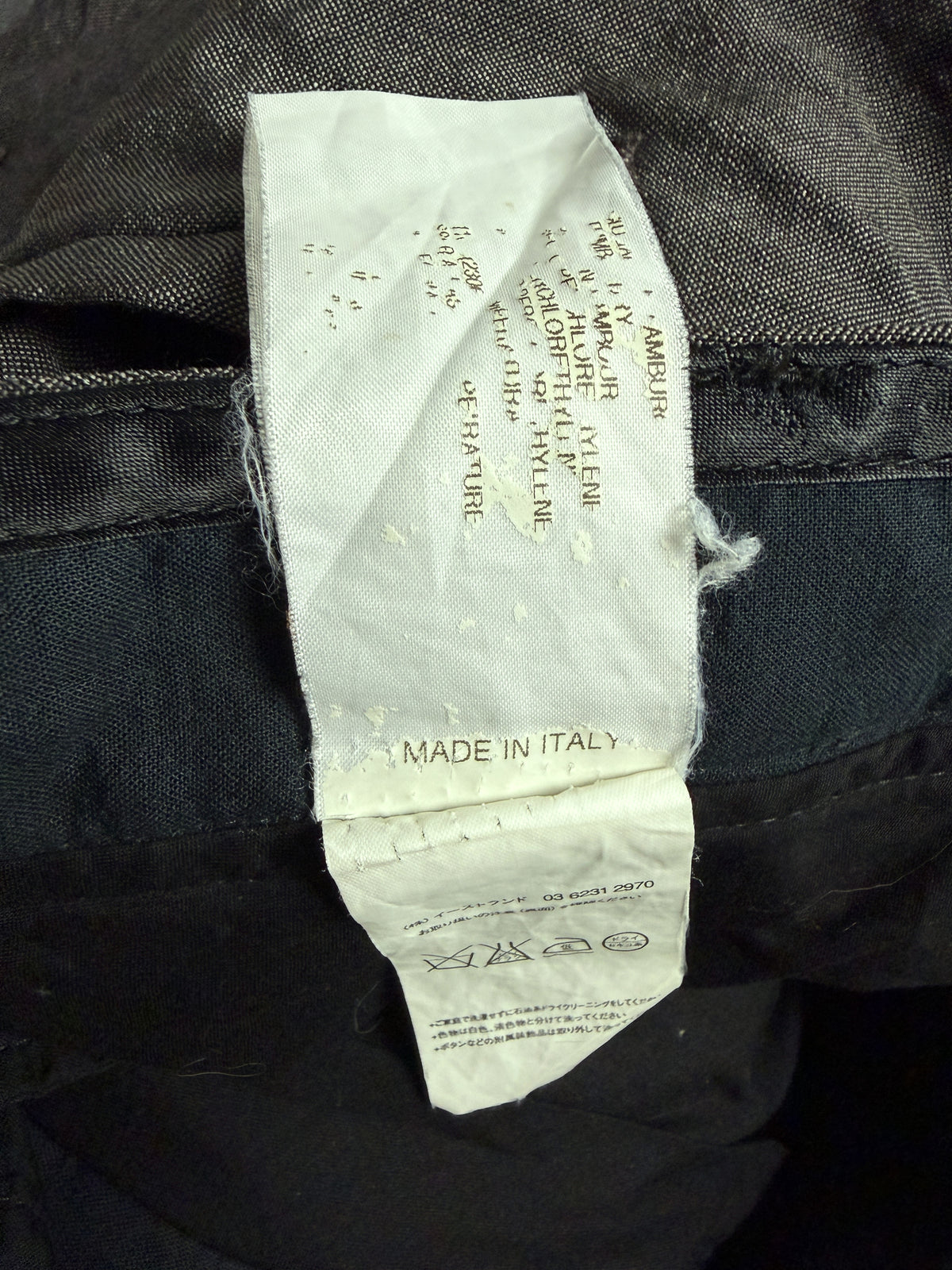 Worn care label, MADE IN ITALY visible