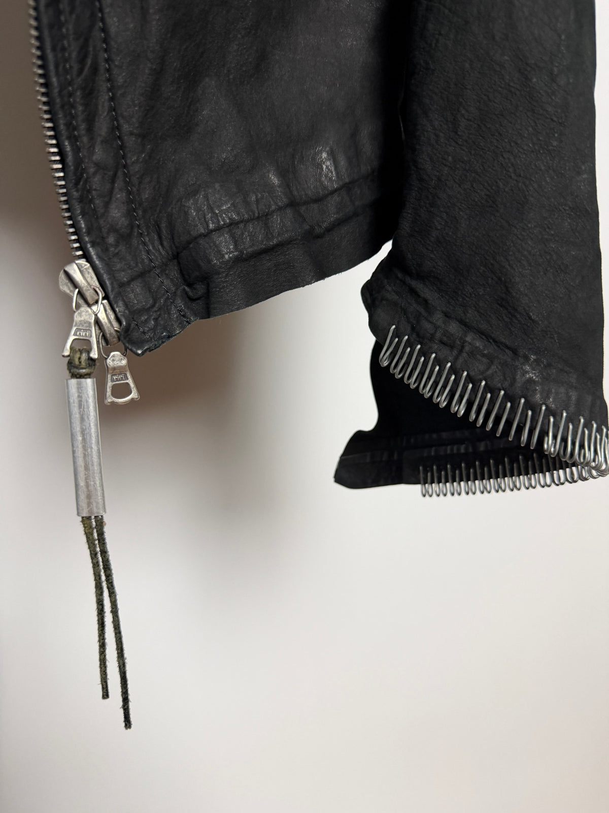 Isaac Sellam for L'Éclaireur calfskin jacket, zip pulls and staples at the cuff