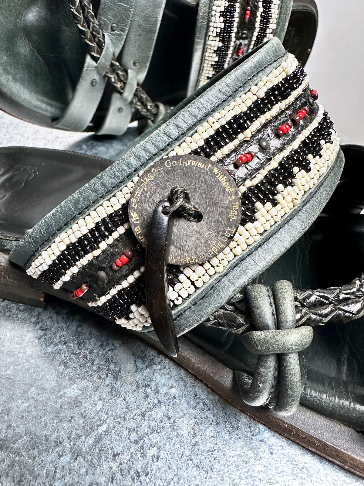 Beadwork and the carved toggle, close