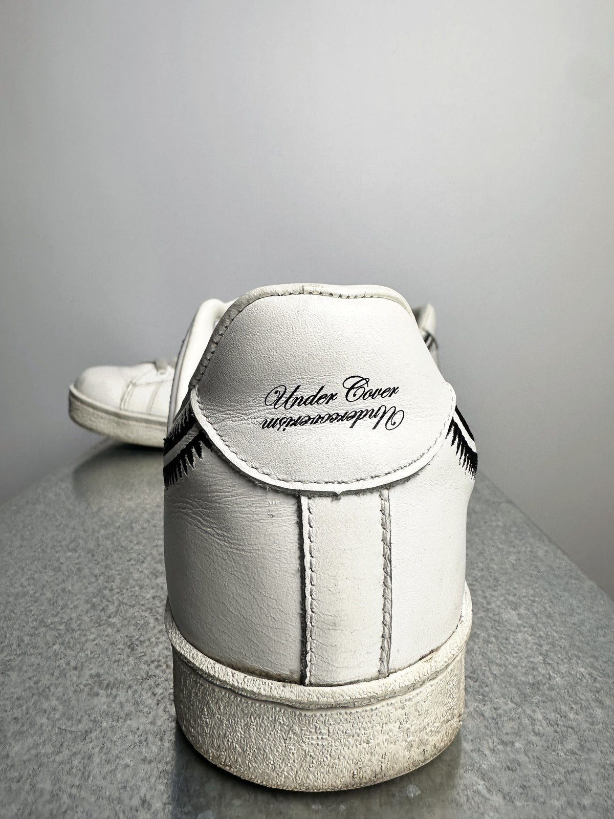 Heel tab, Undercover Undercoverism print