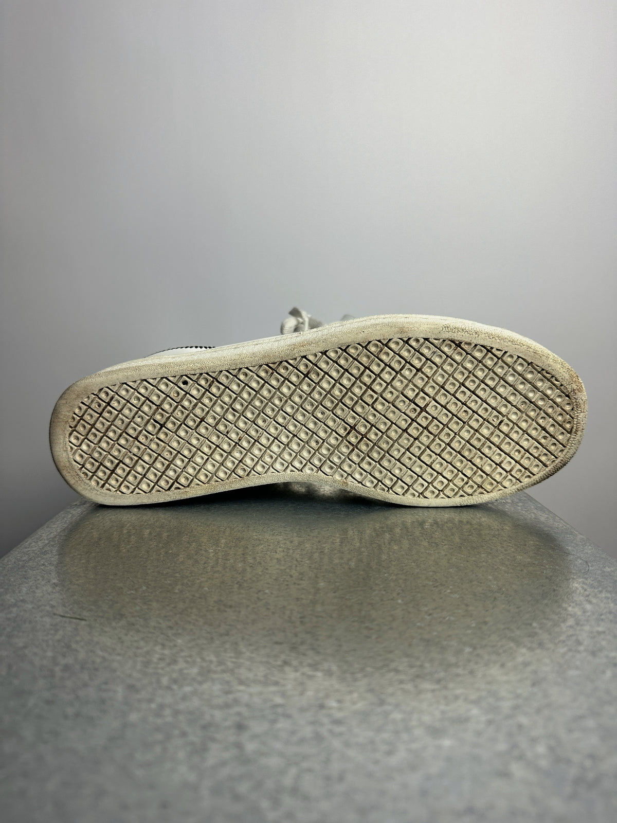 Studded rubber outsole